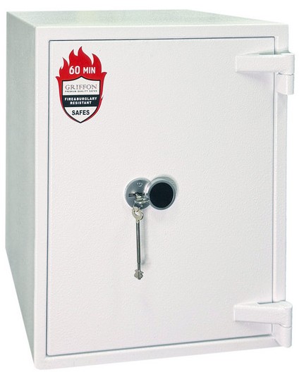 Сейф белого цвета с ключами